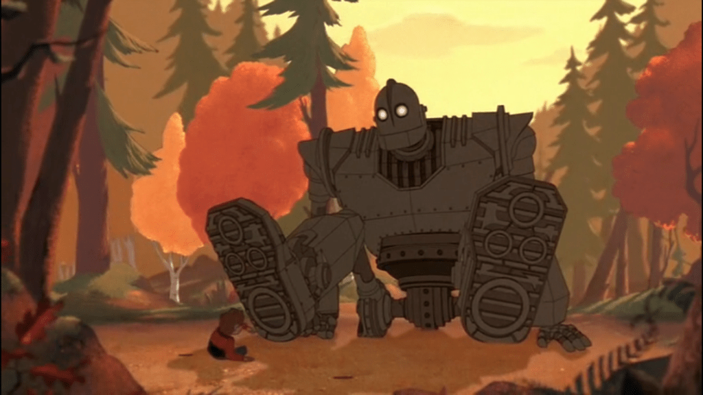 The Iron Giant sitting next to Hogarth in the forest.