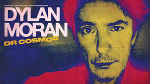 A banner for the show showing Dylan Moran in hues of yellow and pink.