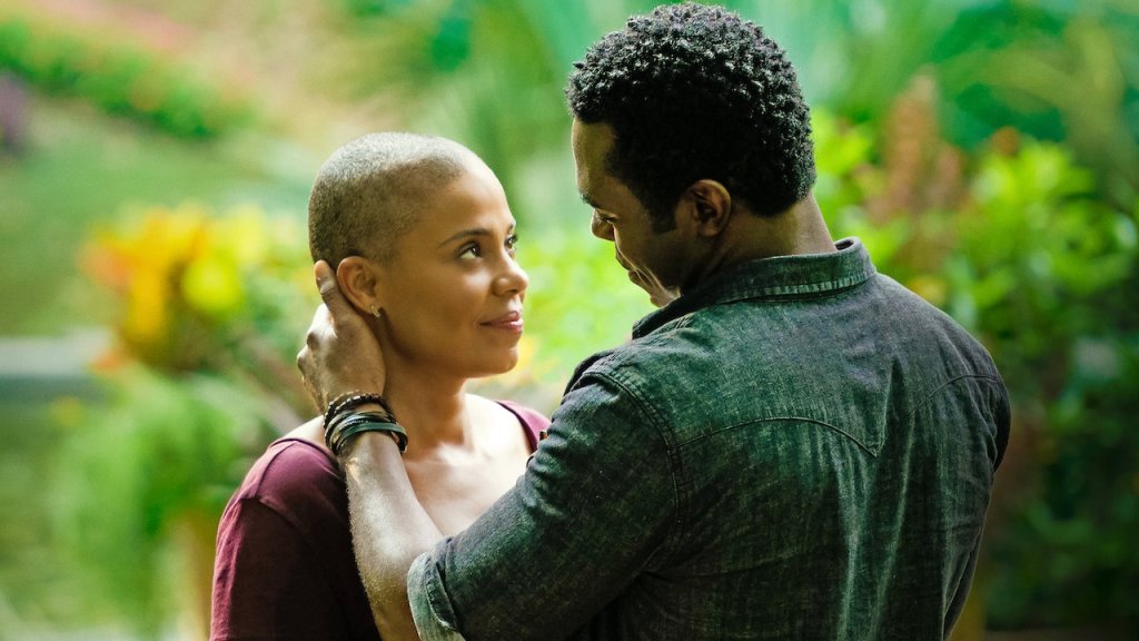 Violet (Sanaa Lathan) and Will (Lyriq Bent) holding each other.