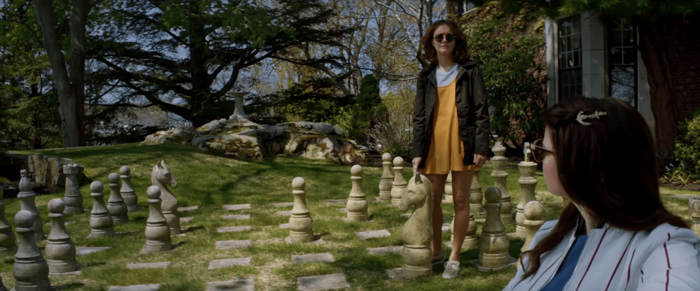 Lily (Anya Taylor-Joy) and Amanda (Olivia Cooke) in Lily's garden. 