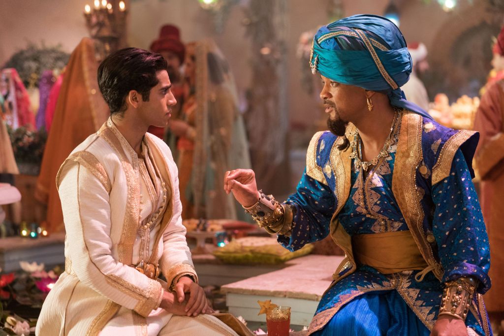 Aladdin (Mena Massoud) as Prince Ali talking to the Genie (Will Smith).
