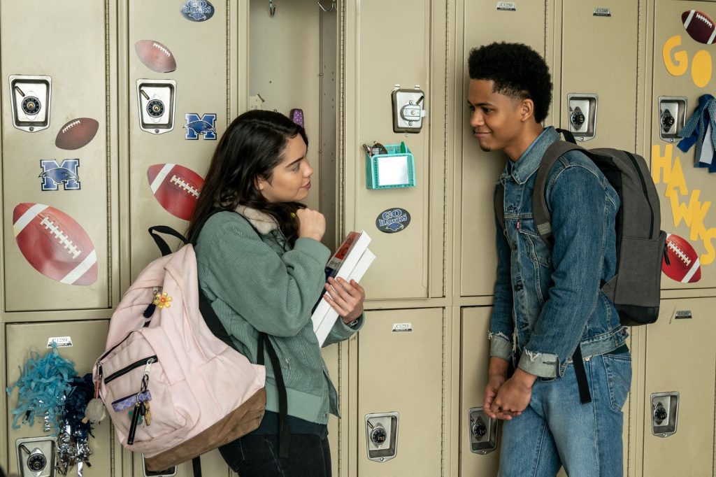Amber (Auli'i Cravalho) talking to Ty (Rhenzy Feliz) in school. 
