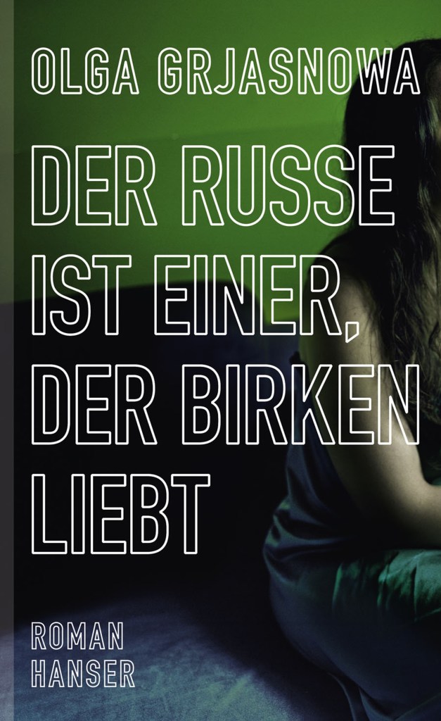 The book cover showing half of a sitting woman, so you can't see her face, in front of a green background.