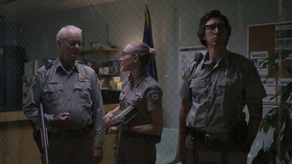 Police officers Mindy (Chloë Sevigny), Cliff (Bill Murray) and Ronnie (Adam Driver) in the police station.