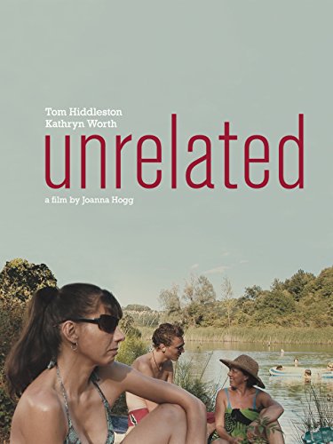 The film poster showing Anna (Kathryn Worth) sitting on the shore of a river or lake. Behind her, we can see Oakley (Tom Hiddleston) talking to Verena (Mary Roscoe).