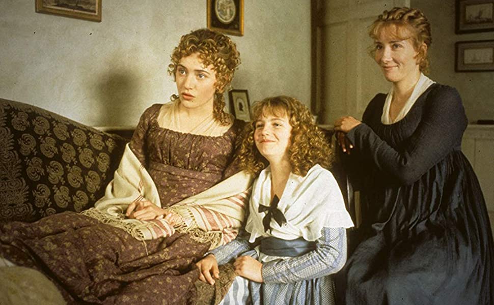 The Dashwood sisters - Marianne (Kate Winslet), Margaret (Emilie François) and Elinor (Emma Thompson) - sitting on and around a sofa.