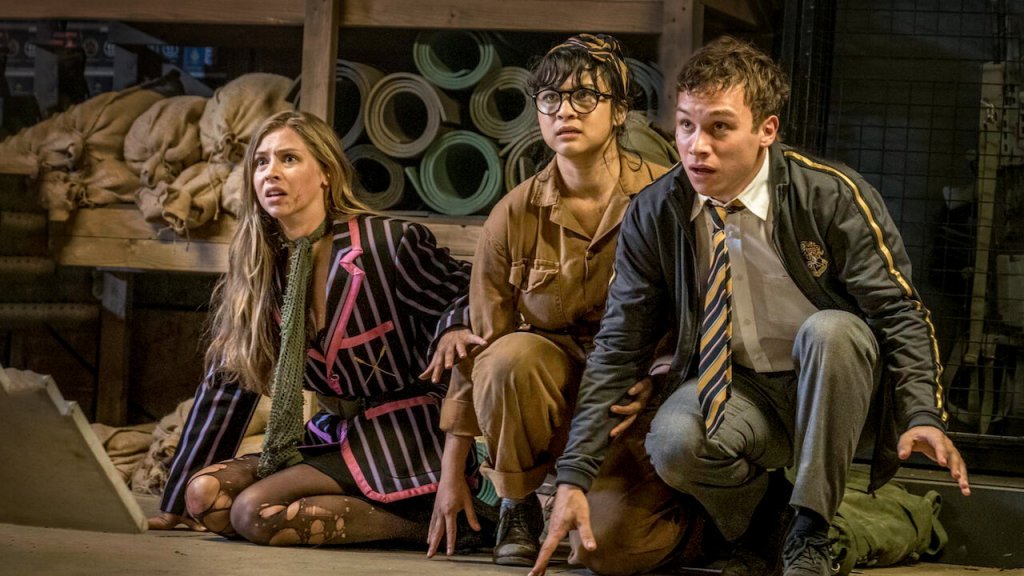 Clemsie (Hermione Corfield), Kay (Isabella Laughland) and Don (Finn Cole) cowering in a cellar.