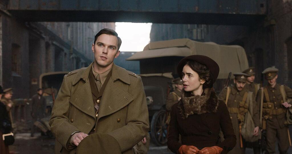 J. R. R. Tolkien (Nicholas Hoult) talking to Edith (Lily Colins)