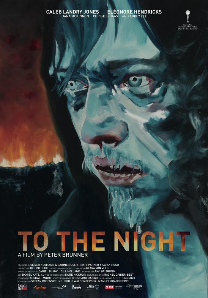 The film poster showing Norman (Caleb Landry Jones) painted in blue colors with a red fire behind him.