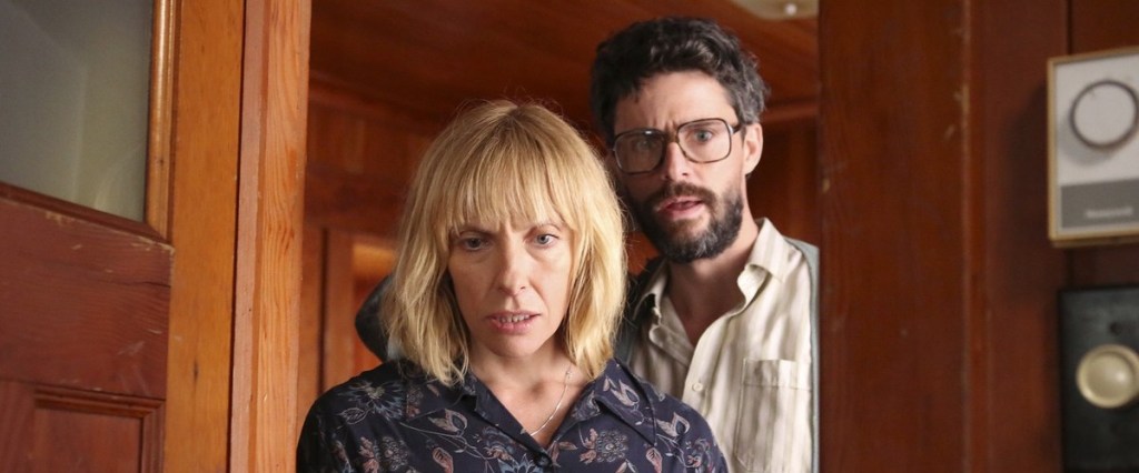 Catherine (Toni Collette) and Ben (Matthew Goode) entering the children's room with horrified expressions.