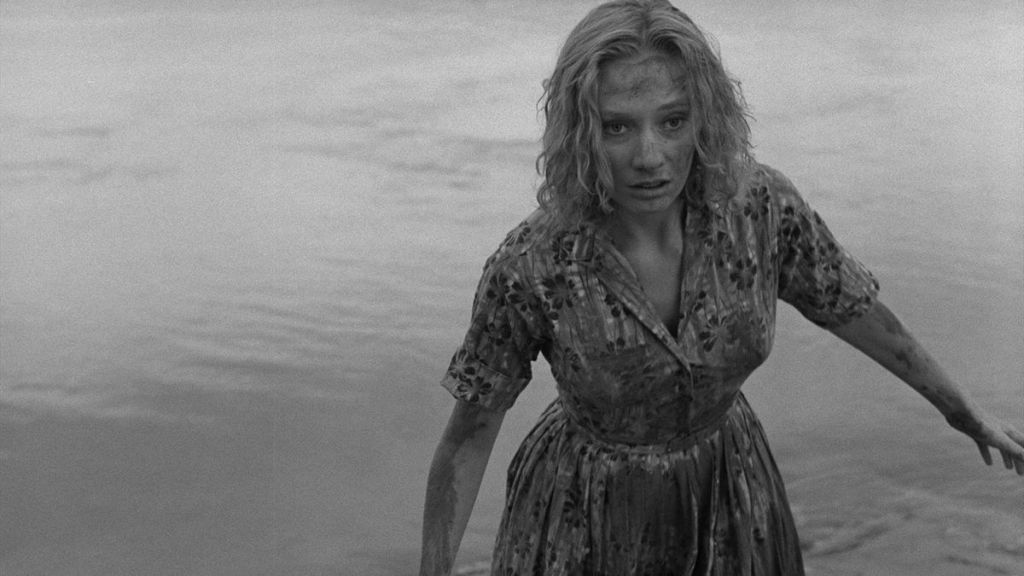 Mary Henry (Candace Hilligoss) emerging from the river.