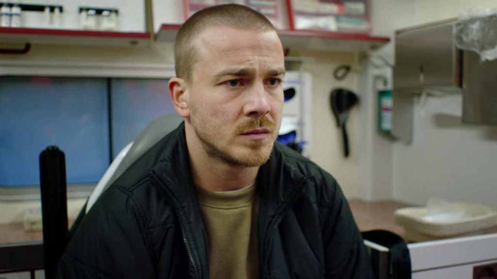 MIcha (Albrecht Schuch) looking worried.