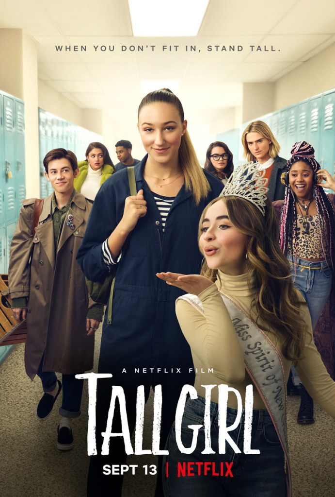 The film poster showing Jodi (Ava Michelle) surrounded by all her school friends, taller than everybody else.
