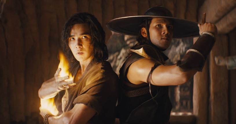 Liu Kang (Ludi Lin) and Kung Lao (Max Huang) back-to-back in fighiting poses.