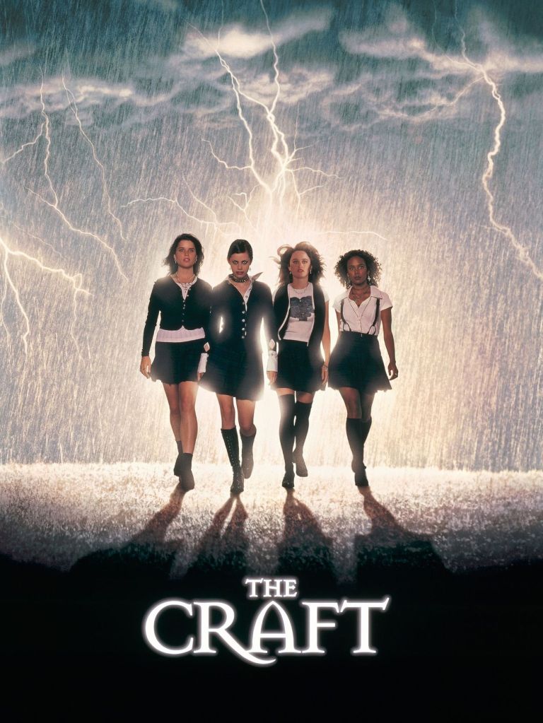The film poster showing Bonnie (Neve Campbell), Nancy (Fairuza Balk), Sarah (Robin Tunney) and Rochelle (Rachel True) walking through a thunderstorm with a lot of lightning. 