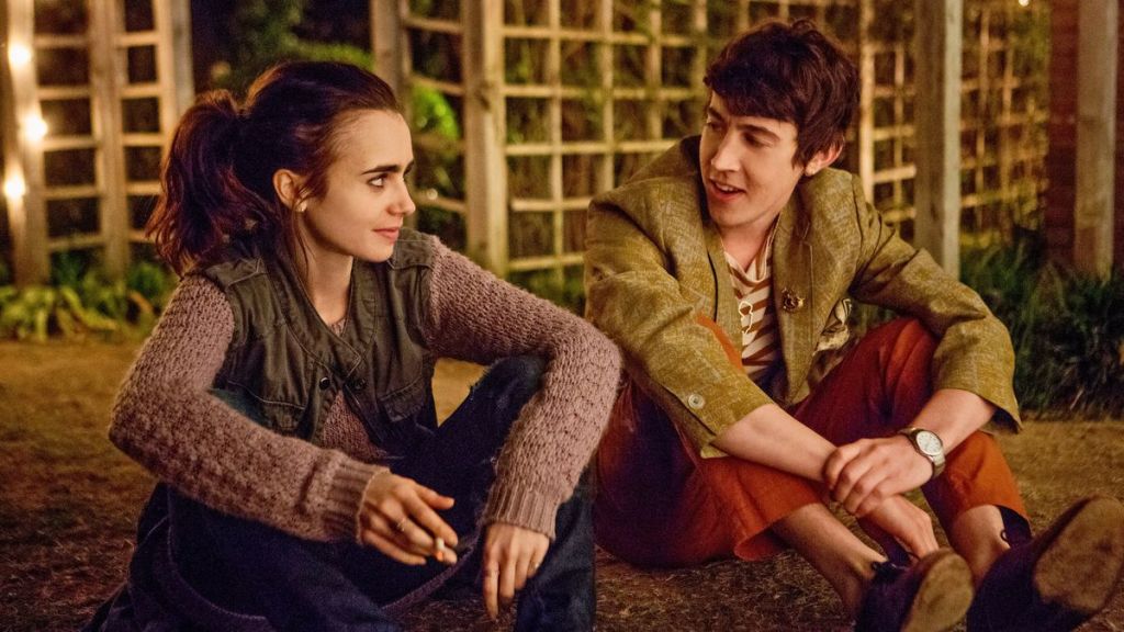 Ellen (Lily Collins) talking to Luke (Alex Sharp).
