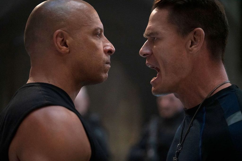 Dom (Vin Diesel) and his brother Jacob (John Cena) facing each other angrily.