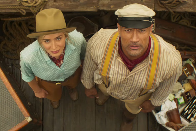 Frank (Dwayne Johnson) and Lily (Emily Blunt) looking upwards at the camera.