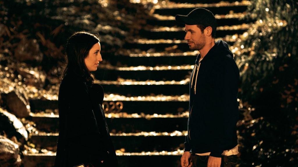 Casper (Sam Rosen) and Rebecca (Zoe Lister-Jones) trying to say good-bye. 