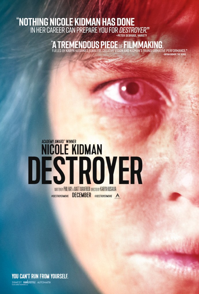 The film poster showing a close-up of half of Erin's (Nicole Kidman) face with deep shadows under her eyes in blue and red light.