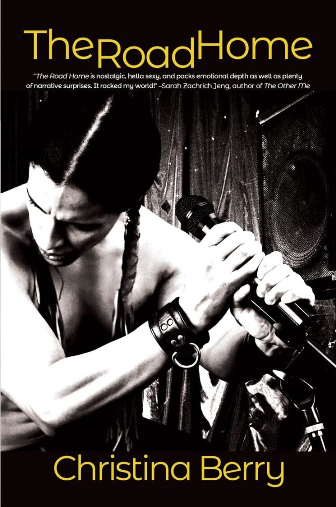 The book cover showing a shirtless Native Americam man with long braids holding a microphone.
