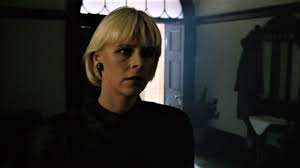 Cathy (Penny Cook) looking very serious.