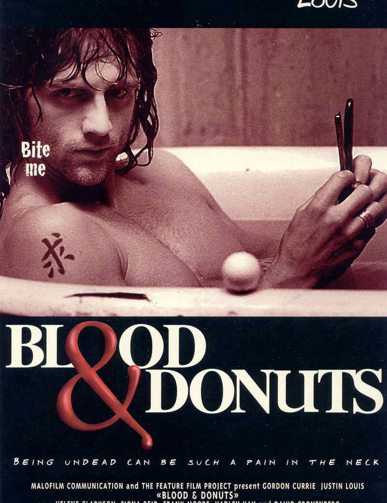 The film poster showing Boya (Gordon Currie) sitting in a bathtub, a razor in hand.