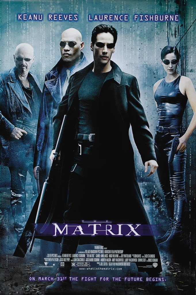 The film poster showing Neo (Keanu Reeves), and behind him Cypher (Joe Pantoliano), Morpheus (Laurence Fishburne) and Trinity (Carrie-Anne Moss). All dressed n black, wearing sunglasses and holding weapons.
