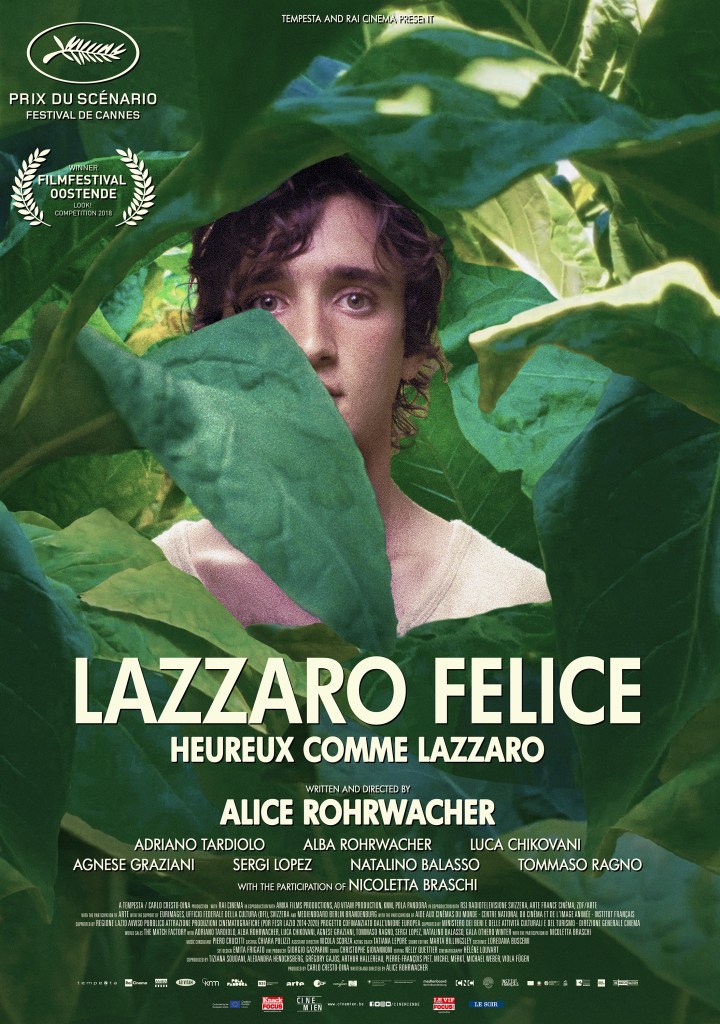 The film poster showing Lazzaro (Adriano Tardiolo) half hidden behind tobacco leaves.