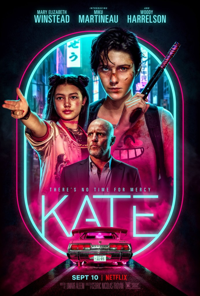 The film poster showing Kate (Mary Elizabeth Winstead), Ani (Miku Patricia Martineau) and Varrick (Woody Harrelson) in a neon frame.
