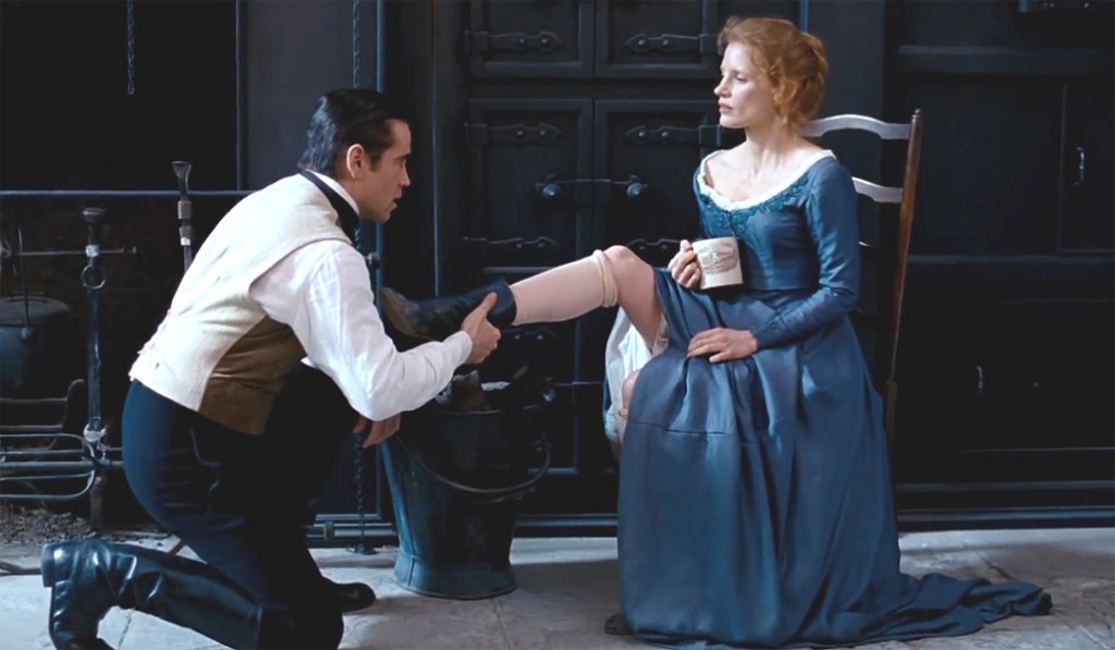 Miss Julie (Jessica Chastain) making Jean (Colin Farrell) kiss her boot.