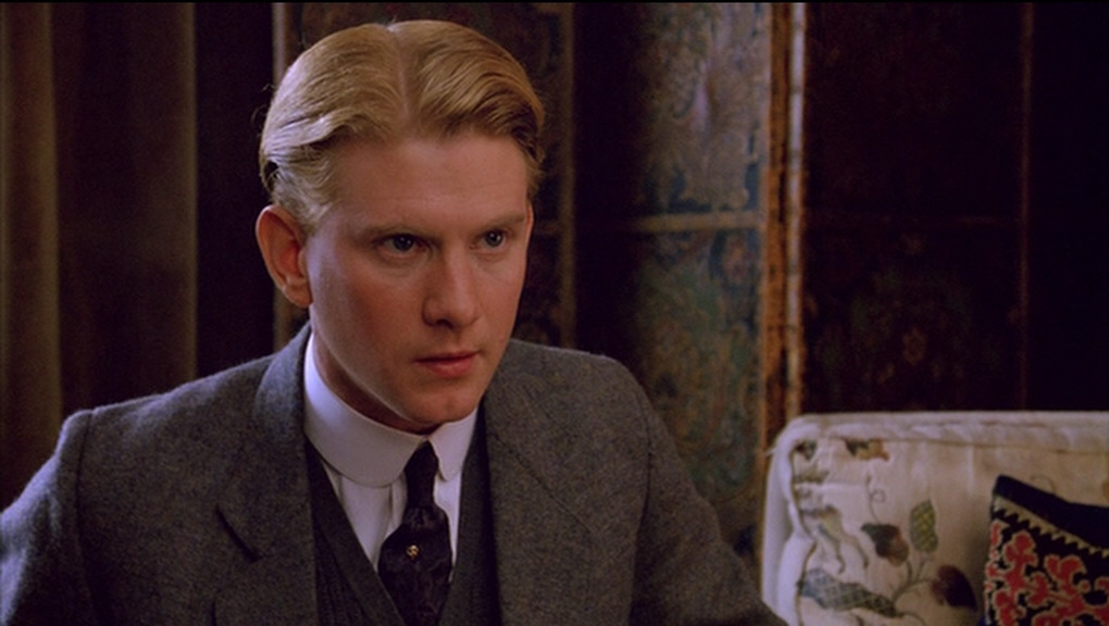 Maurice (James Wilby) looking very serious.