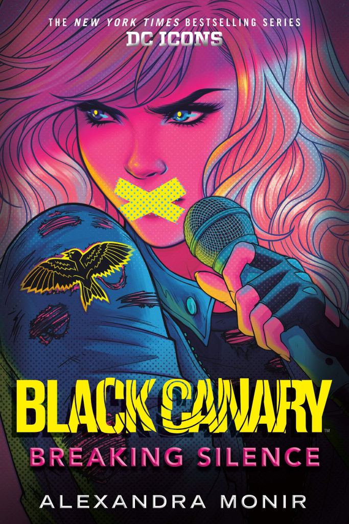 The book cover showing a drawn blond girl with bandages across her mouth, a black canary on the shoulder of her torn leather jacket.