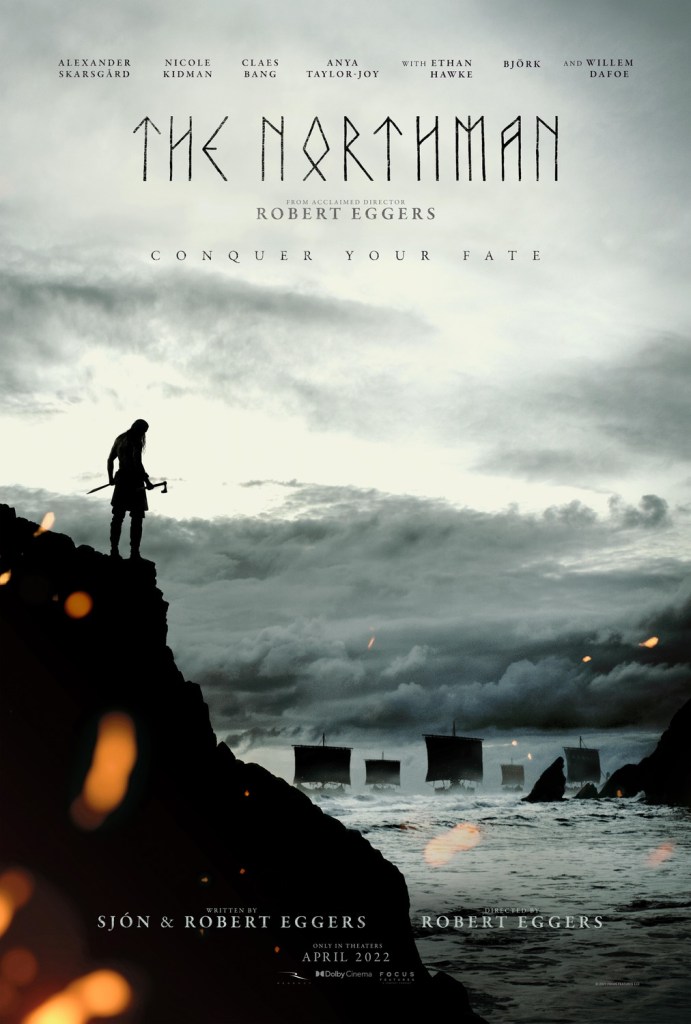 The film poster showing Amleth (Alexander Skarsgård) standing on a cliff, watching a fleet in the sea.