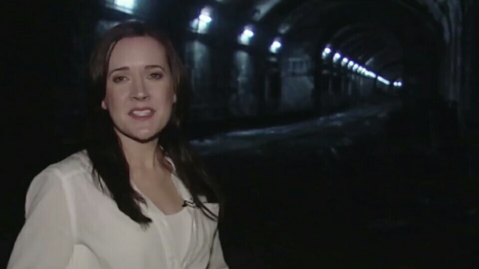 Natasha (Bel Deliá) reporting in the tunnels.