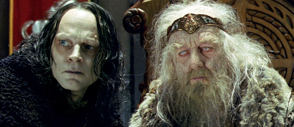 Wormtongue (Brad Dourif) next to King Theoden (Bernard Hill) who looks very old indeed.