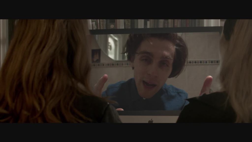 Dan (Jack Farthing) giving Seph and Alex video instructions.