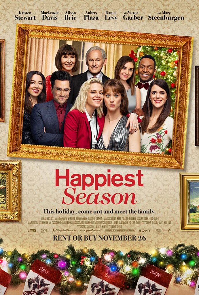 The film poster with the main characters arranged as if in a family portrait that hangs crookedly over a fire place with Christmas decorations.