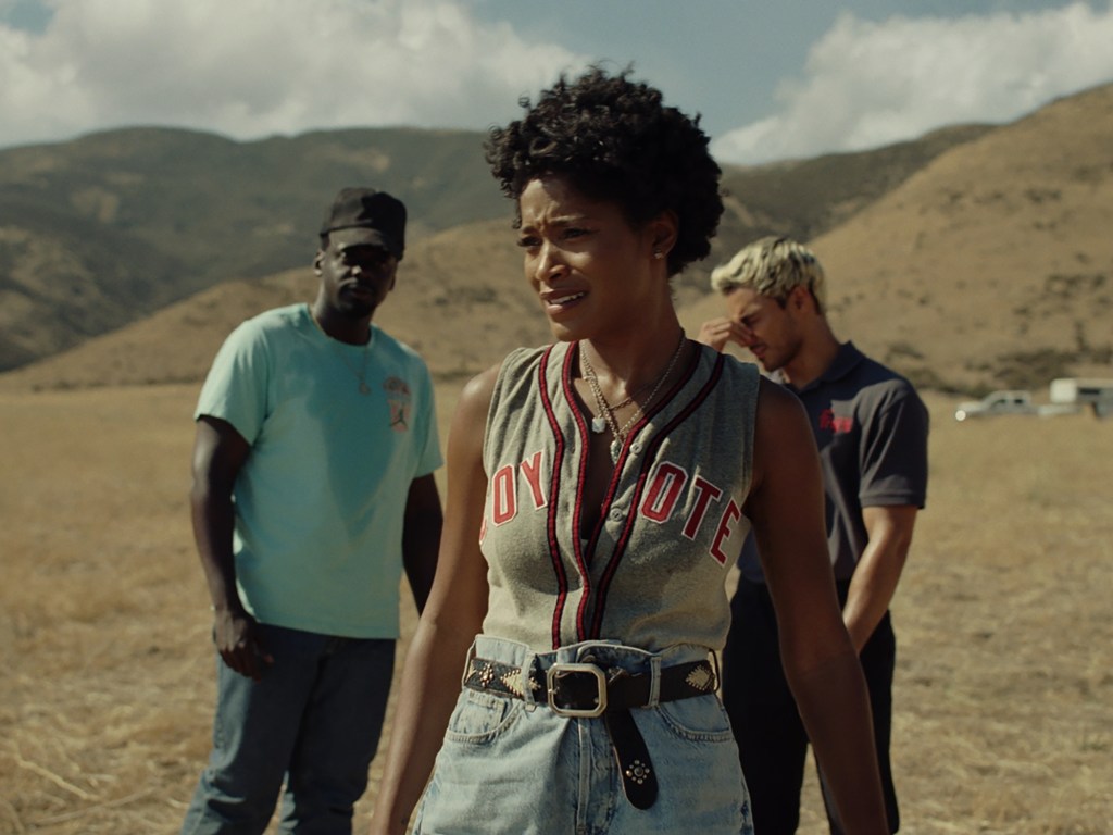 Emerald (Keke Palmer), OJ (Daniel Kaluuya) and Angel (Brandon Perea) looking dejected.