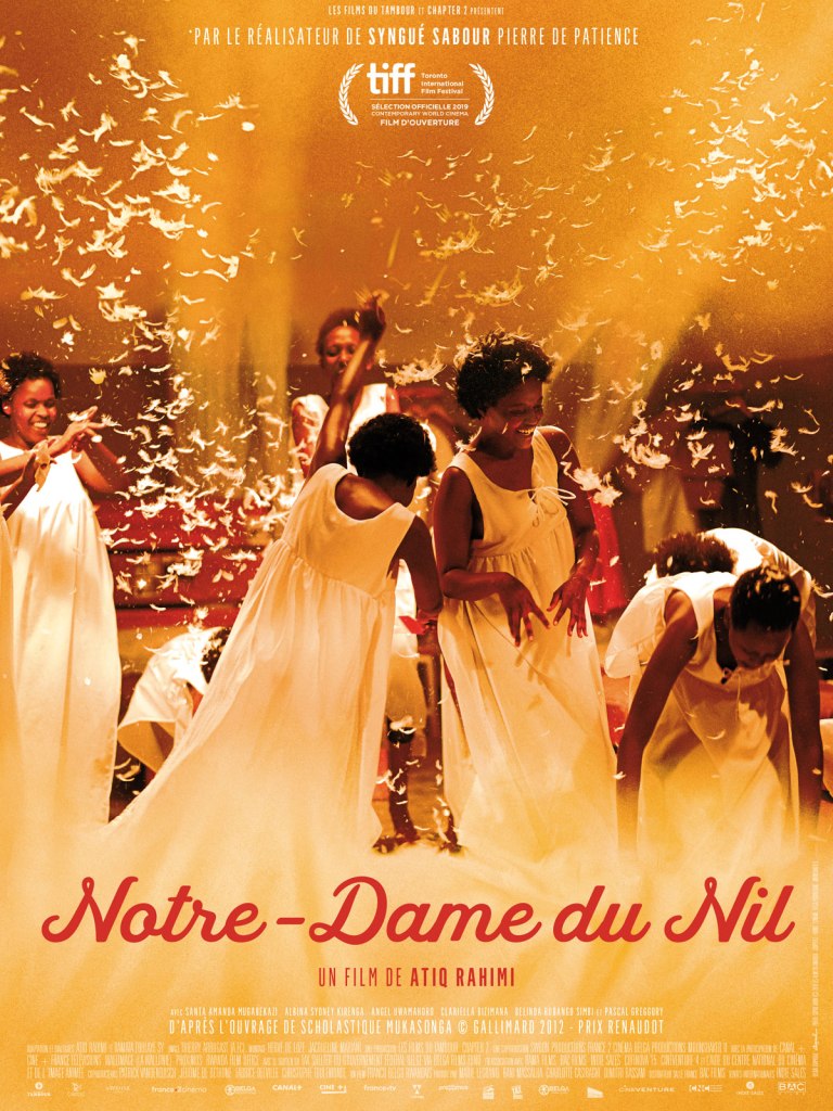 The film poster showing a group of girls in white night-gowns having a pillow-fight.