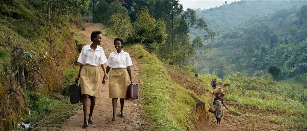 Veronica (Clariella Bizimana) and Viriginia (Amanda Mugabezaki) walking away from school.