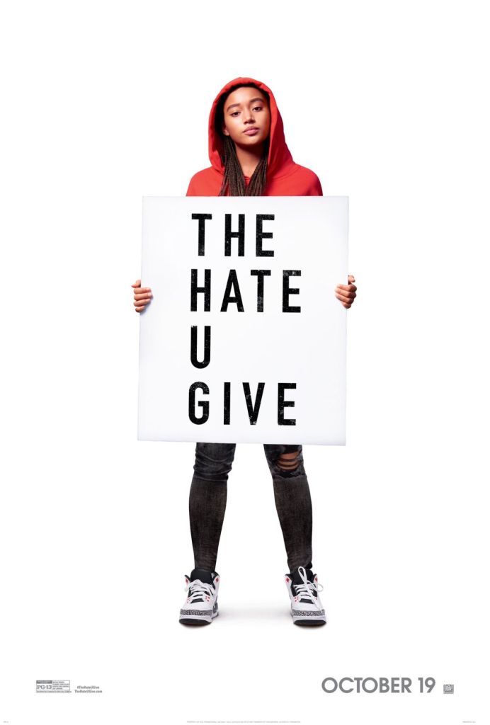 The film poster showing Starr (Amandla Stenberg) holding a sign with the movie title.
