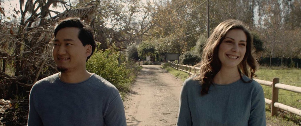Anar (Iveel Mashbat) and Kassy (Jana Miley) on a walk together, smiling. 
