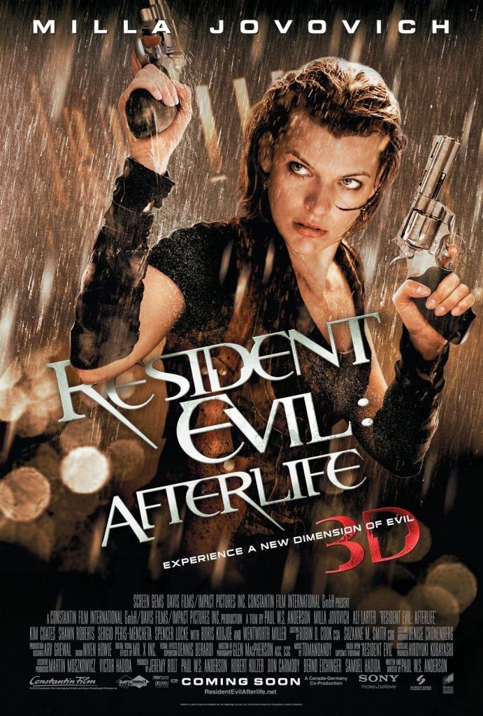 The film poster showing Alice (Milla Jovovich, with two guns pointing upwards. It's raining.