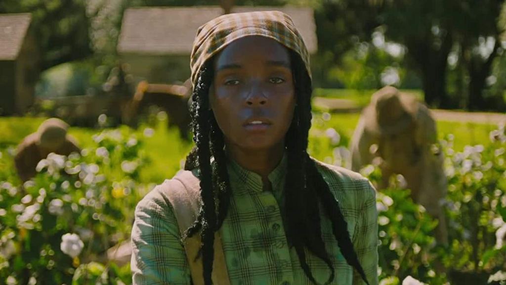 Eden (Janelle Monáe) working in the cotton field.
