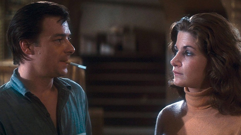 Napoleon Wilson (Darwin Joston) and Leigh (Laurie Zimmer) looking at each other intently.