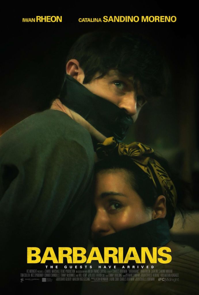 The film poster showing Adam (Iwan Rheon) and Eva (Catalina Sandino Moreno) huddled into each other, their mouths gagged with black fabric.