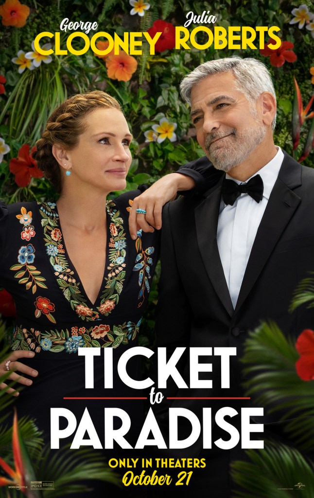 The film poster showing Georgia (Julia Roberts) and David (George Clooney) standing close to each other surrounded by tropical flowers.