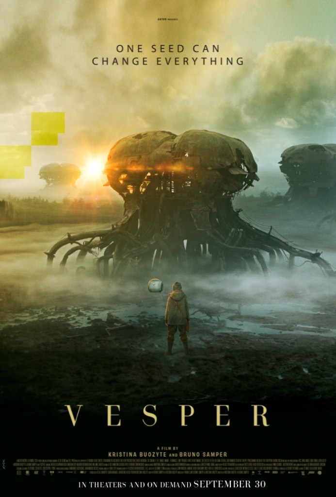 The film poster showing Vesper (Raffiella Chapman) standing in front of a great machine on a field. Next to her is a cubic drone.