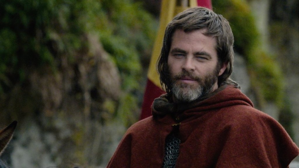 Robert Bruce (Chris Pine) looking critically.